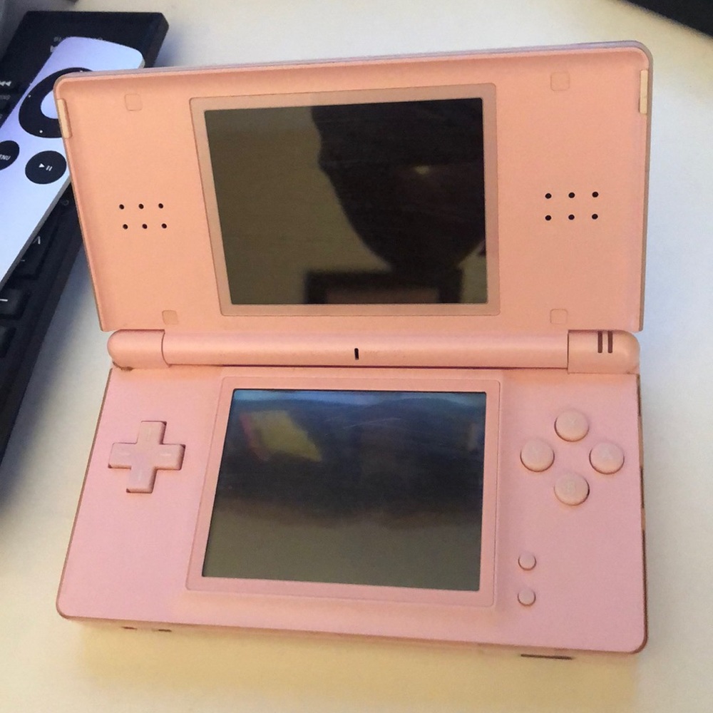 Pink Nintendo DS With Pen ( used good condition)